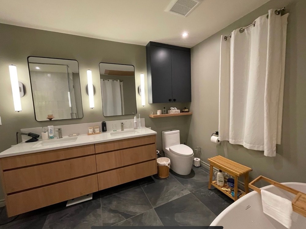 Salle de bain rénovée par M. Construire — après